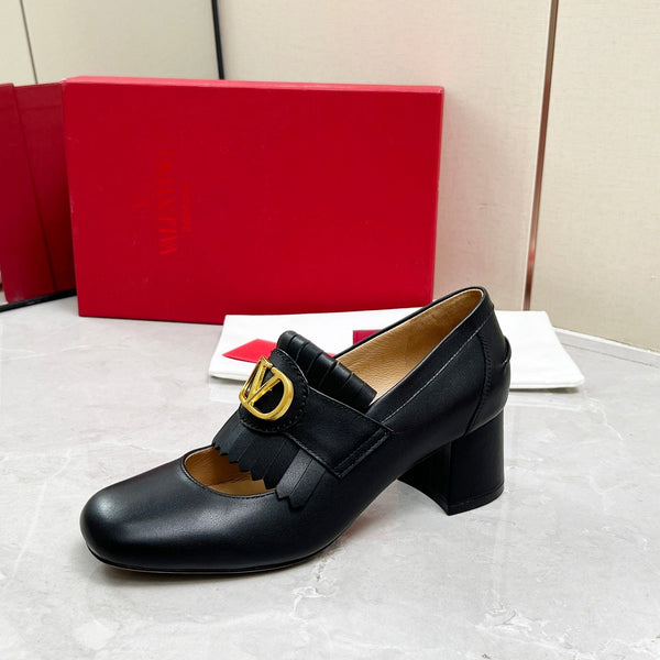 Mocassino con tacco VT 25 Signature in pelle di vitello nera 293943
