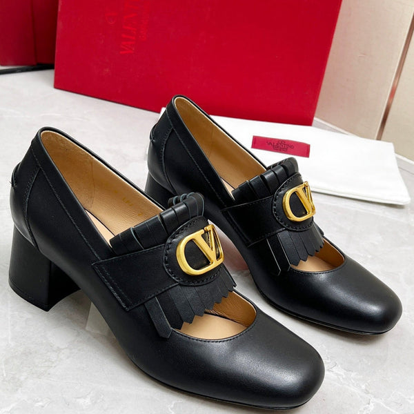 Mocassino con tacco VT 25 Signature in pelle di vitello nera 293943
