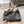 ALAIA SPIKE JEWEL MULES IN BLACK CALFSKIN