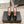 ALAIA SPIKE JEWEL MULES IN BLACK GLOSSY CALFSKIN