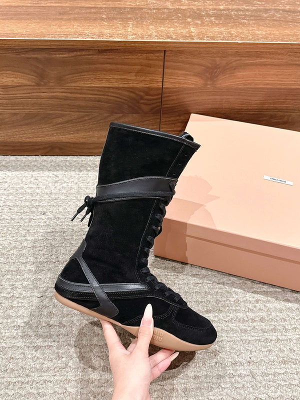 Miumiu 25 Bottes en daim et cuir de veau noirs 553694