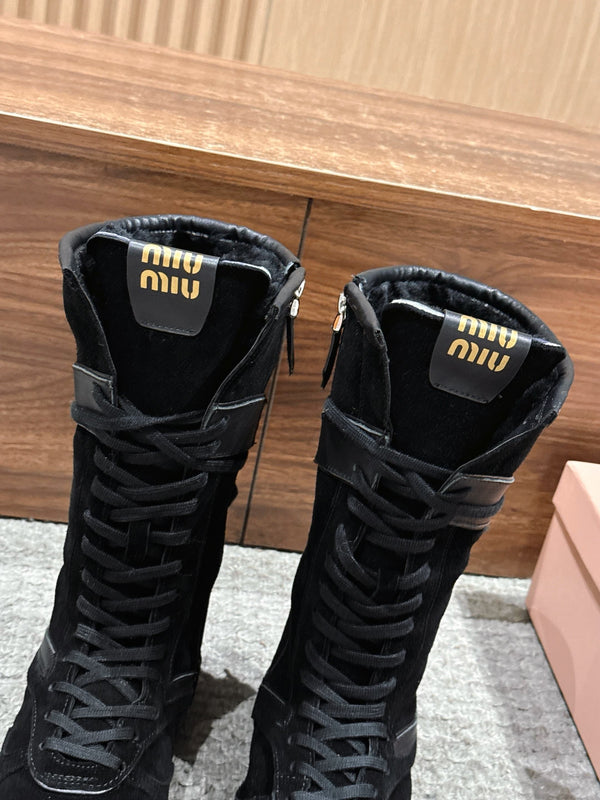 Miumiu 25 Bottes en daim et cuir de veau noirs 553694