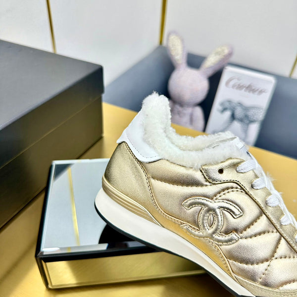 CC Low Sneaker in pelle di vacchetta di lana metallizzata oro 413859