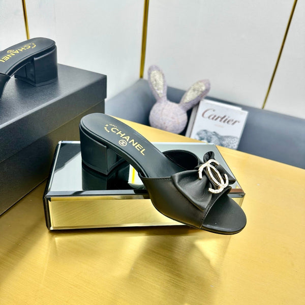 cc 25 bow mule sandal 50mm black sheepskin 238478