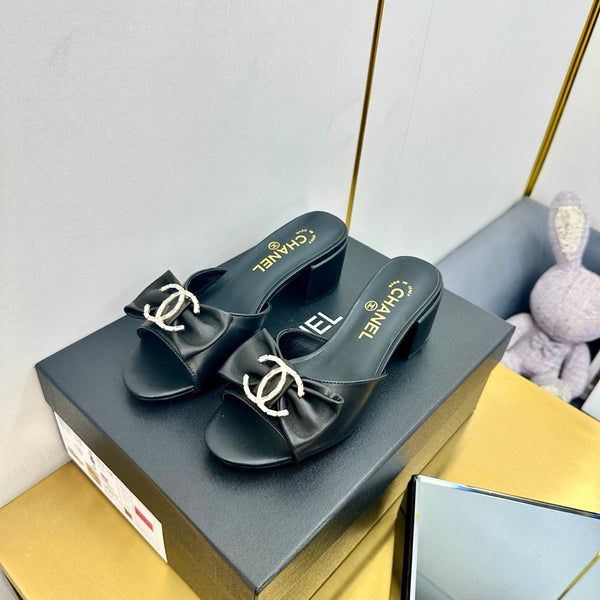 cc 25 bow mule sandal 50mm black sheepskin 238478