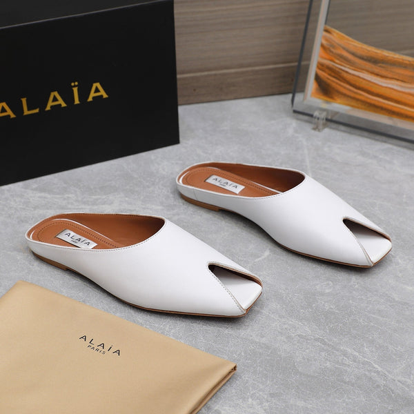 MULE PIATTA ALAIA IN PELLE DI AGNELLO BIANCA