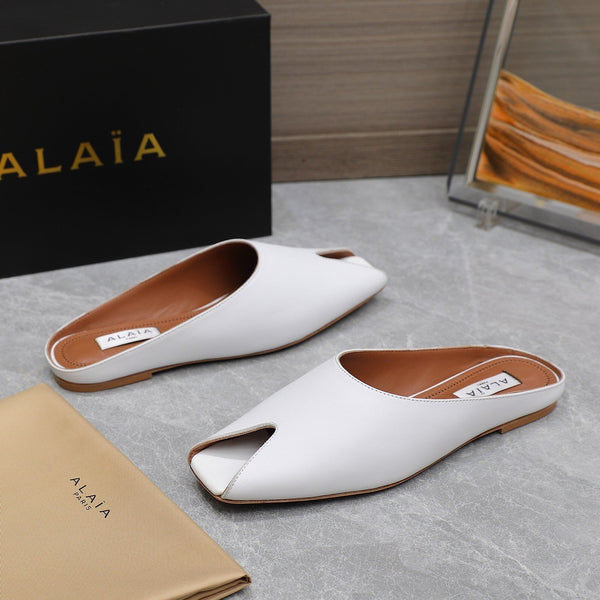 MULE PIATTA ALAIA IN PELLE DI AGNELLO BIANCA