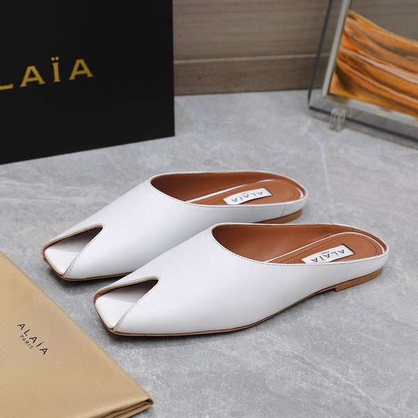 MULE PIATTA ALAIA IN PELLE DI AGNELLO BIANCA