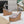 SANDALO ALAIA CON ZEPPA IN RETE GRIGIO CHIARO E GOMMA BEIGE