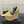 Sandalo con plateau ALAIA in montone beige dorato 389630