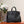 BORSA KELLY SELLIER 25 IN PELLE DI STRUZZO NERA CON FERRAMENTA ORO (FATTA SU MISURA PER ORDINE)