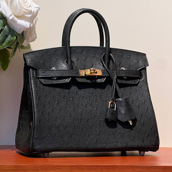 BORSA KELLY SELLIER 25 IN PELLE DI STRUZZO NERA CON FERRAMENTA ORO (FATTA SU MISURA PER ORDINE)
