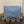 coussin bb 21 blue denim gold hardware