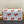 LV x TM Pochette Métis East West 21.5cm White Cherry Canvas