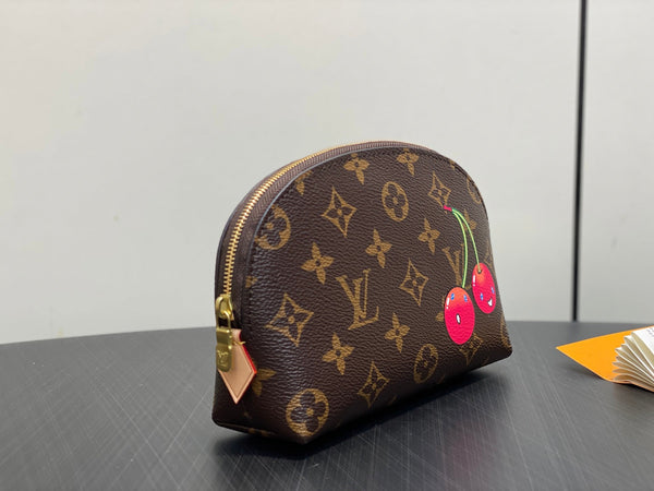 Pochette per cosmetici LV x TM in tela monogrammata PM 
