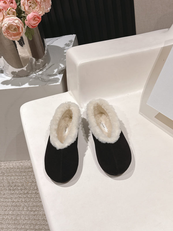 The Row 2025 Chaussures plates doublées de fourrure Mélange noir Daim blanc Laine 560505