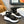 CHLOÉ NAMA WEDGE SANDALS IN BLACK FABRIC AND WHITE RUBBER