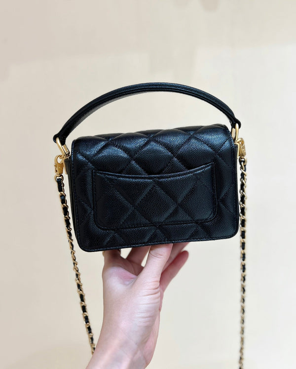 CC24K Mini Borsa con patta e manico 16 cm Nero Caviar Light GHW