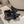 POINTED-TOE FLATS WITH BOW IN BLACK SOFT LAMBSKIN
