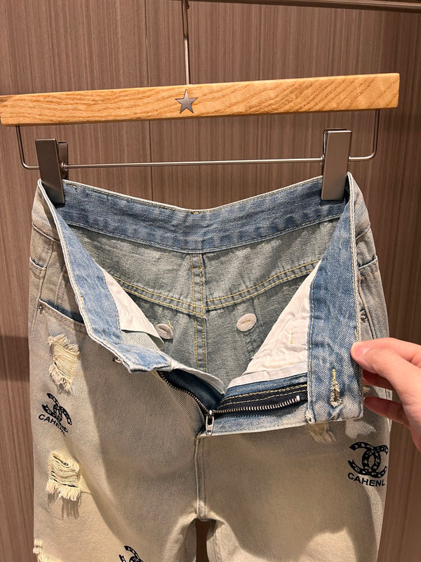 Jeans strappati stampati con doppia C CC in cotone blu chiaro retrò