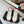 MID-TOP SNEAKERS IN WHITE AND RED TRIM PERFORATED LAMBSKIN