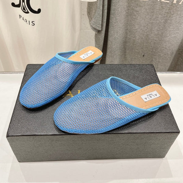 MULES PIATTI ALAIA IN RETE BLU CERULEO