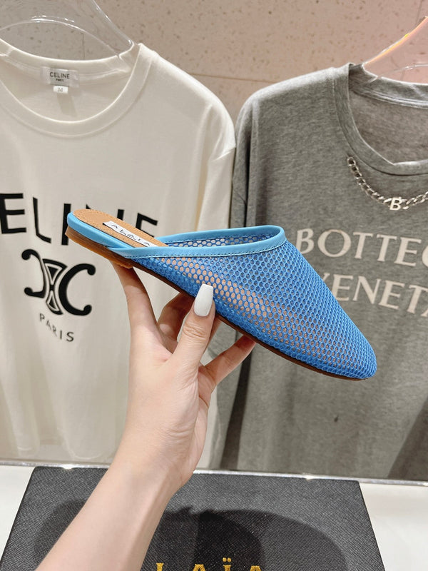 MULES PIATTI ALAIA IN RETE BLU CERULEO