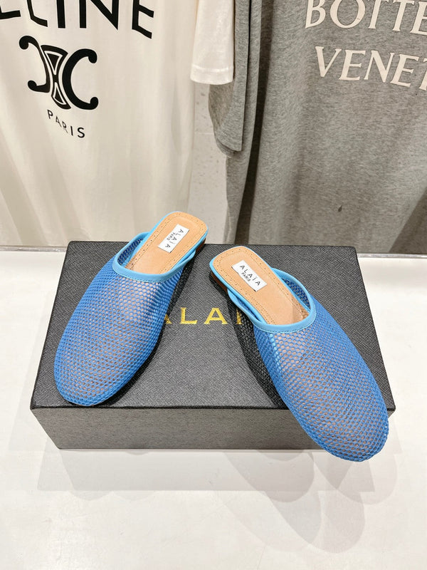 MULES PIATTI ALAIA IN RETE BLU CERULEO
