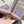 ALAIA FLAT MULES IN LIGHT PURPLE MESH FISHNET