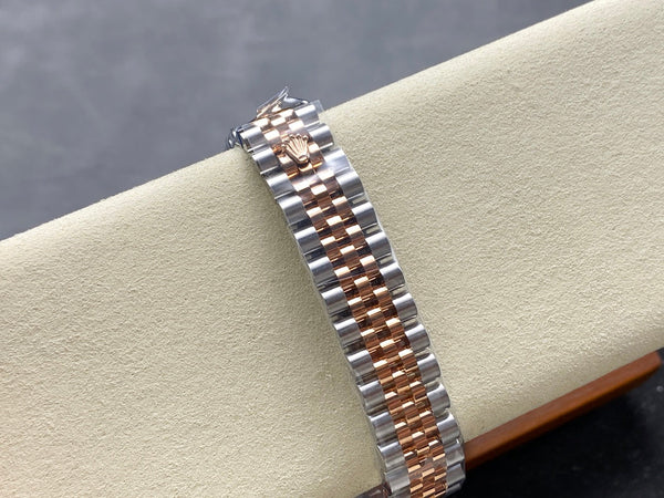 Datejust 31mm in oro rosa, acciaio, lunetta con diamanti, quadrante rosa