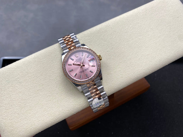 Datejust 31mm in oro rosa, acciaio, lunetta con diamanti, quadrante rosa