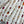 LV 25 Decorative Pattern Gemstone Chain Pleated Skirt White Poliester