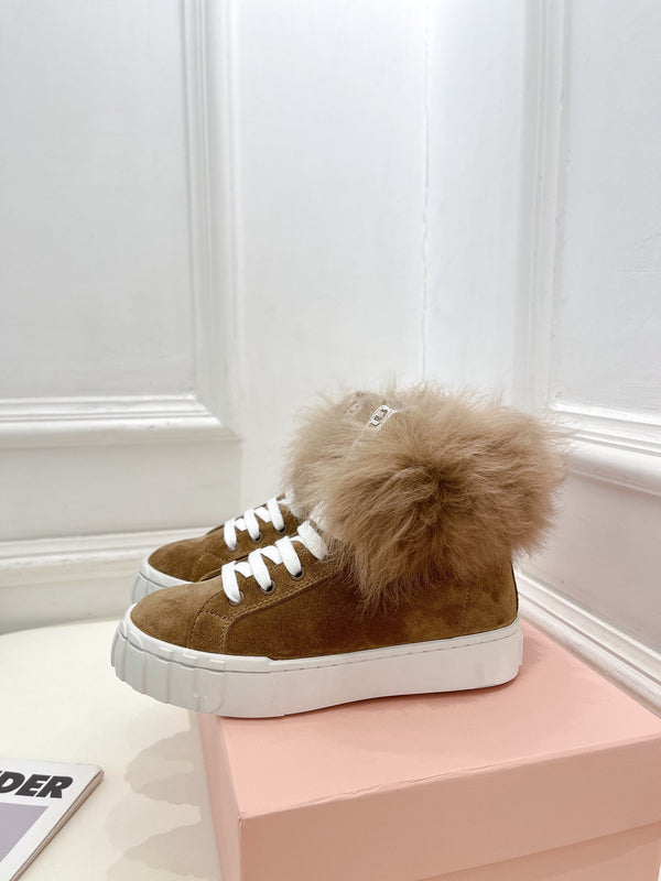 Stivaletti Miu in lana color cuoio