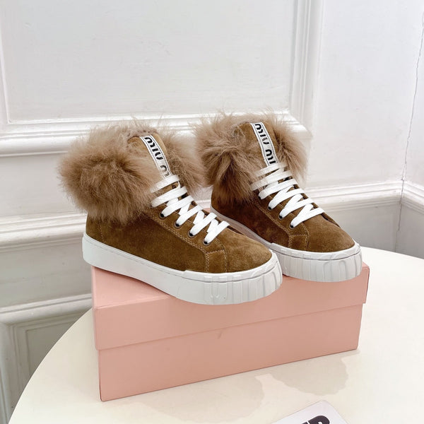 Stivaletti Miu in lana color cuoio