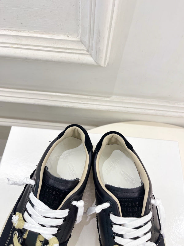 MM 26s New Evolution Sneakers Black Canvas Calfskin 947483