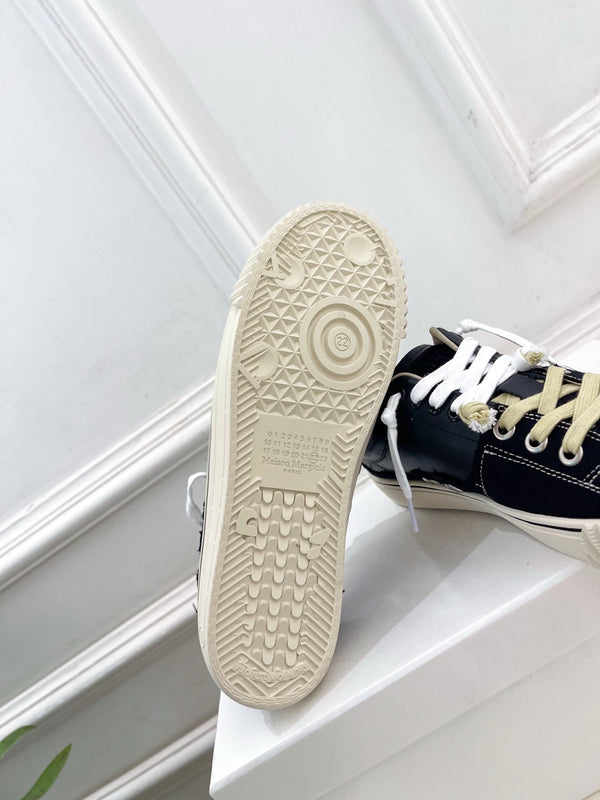 MM 26s New Evolution Sneakers Black Canvas Calfskin 947483
