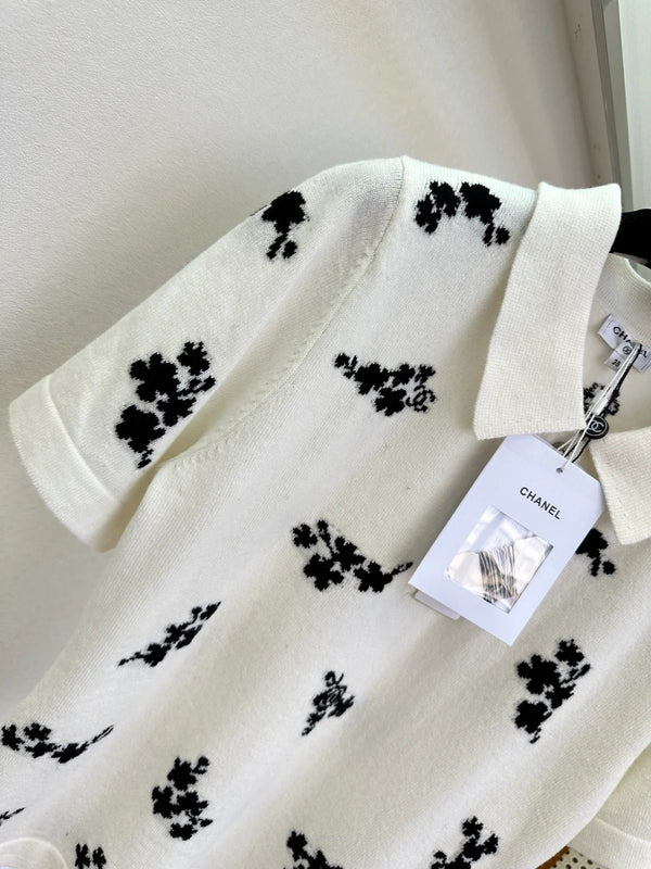 Polo Chanel 2026 en coton noir et blanc à imprimé floral