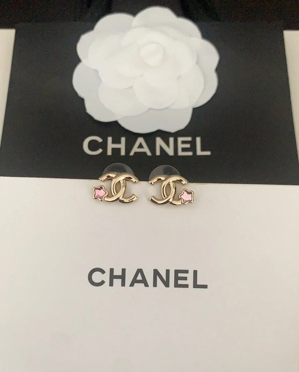 CC Boucles d'oreilles en or avec étoile à cinq branches rose, dernière collection