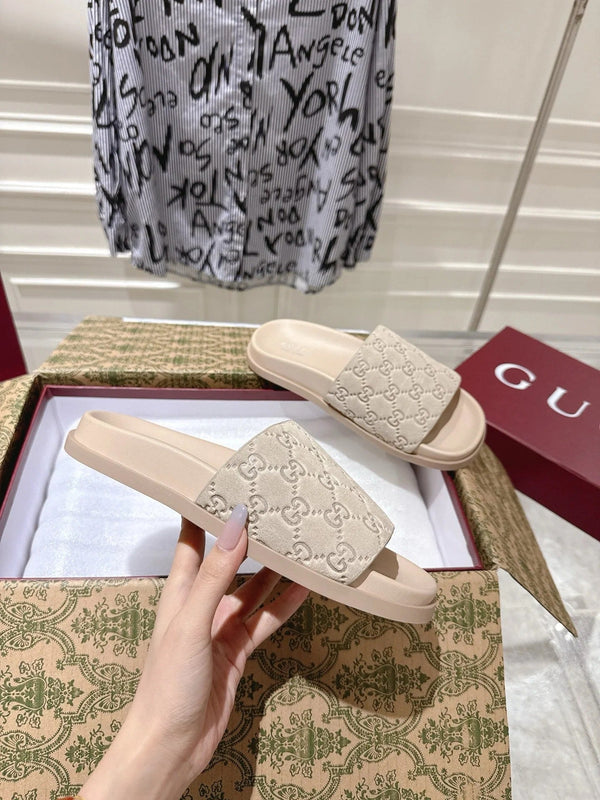 GG SLIDES IN NUDE BEIGE SUEDE WITH EMBOSSED LOGO STYLE 2