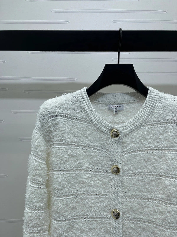 Cardigan Chanel 2026 en laine blanche à rayures et sequins, manches longues