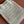 WANDER BUCKET BAG 23 WHITE IN RAFFIA WITH LEATHER TRIM