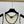 Gilet en maille crochetée Chanel 2026 en laine noire et blanc cassé