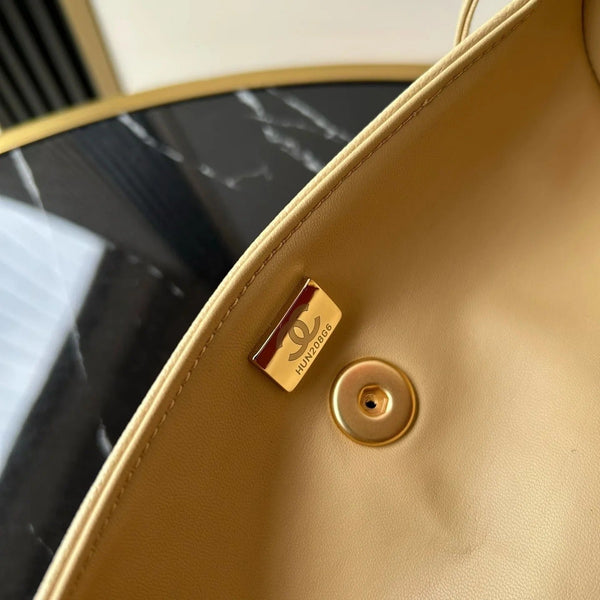 Chanel 2026 Bowling Ball Cylinder Bag 20.5cm Beige Caviar Leather 345493