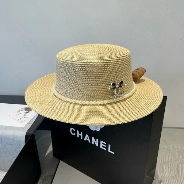 CAPPELLO PIATTO IN PAGLIA CON FIOCCO MARRONE 673922
