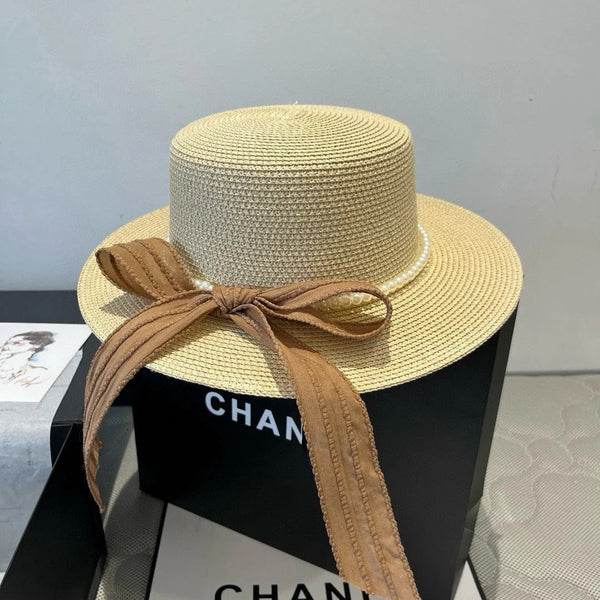 CAPPELLO PIATTO IN PAGLIA CON FIOCCO MARRONE 673922