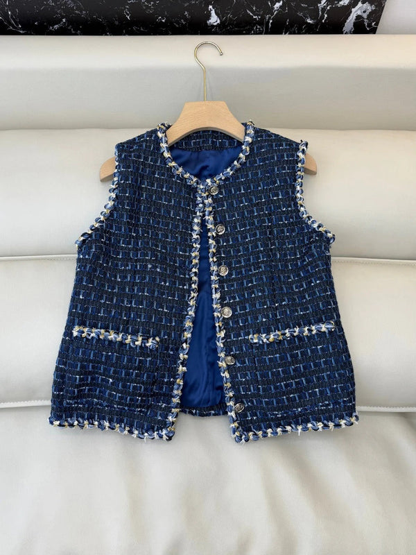 CHANEL Gilet sans manches en tweed 25S 491