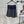 MIUMIU PLEATED LOW-BACK SIDE-SLIT MIDI SKIRT 275985