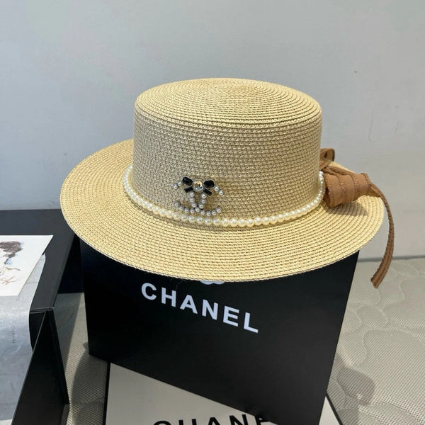 CAPPELLO PIATTO IN PAGLIA CON FIOCCO MARRONE 673922