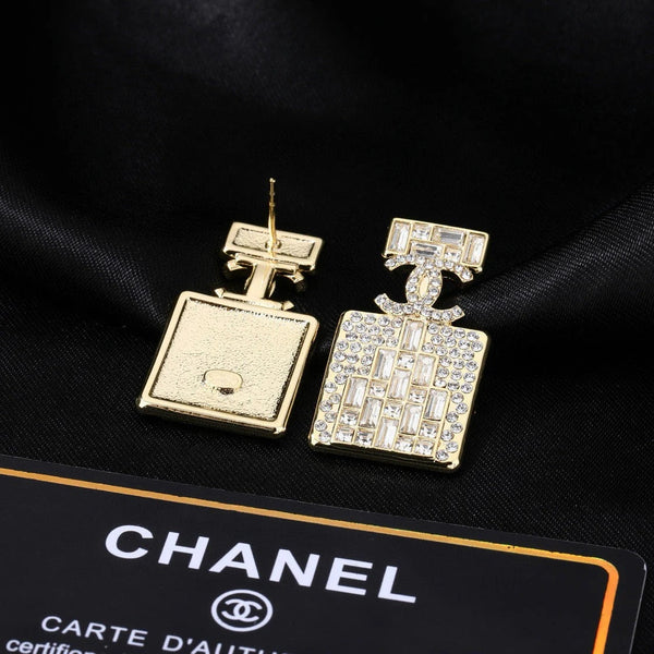 Boucles d'oreilles en or et diamant flacon de parfum CC