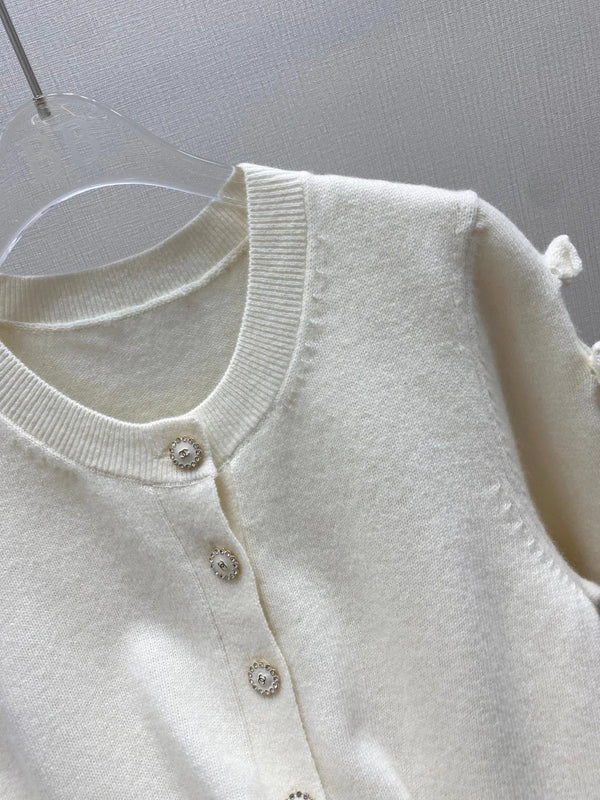CHANEL CARDIGAN EN TRICOT RAS-DE-COU MANCHES COURTES 25S 317